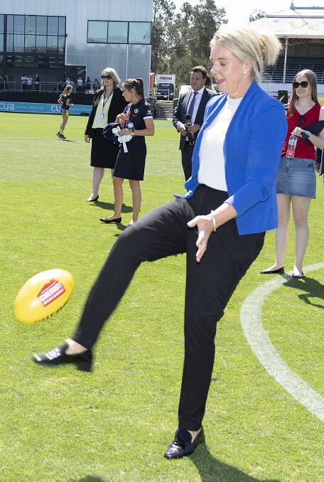 STRONG ADVOCATE: Sports Minister Bridget McKenzie, pictured kicking a footy at Ikon Park this week, has been passionate about health and fitness. Picture: AAP