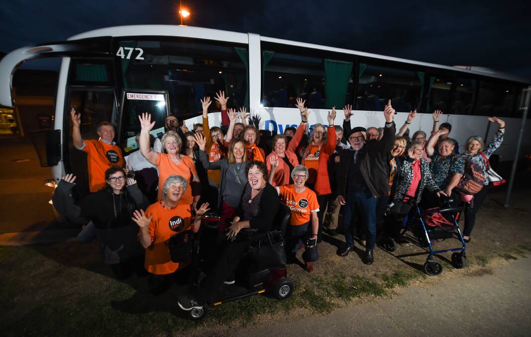 ON THE ROAD: Supporters were on the bus before sunrise on Thursday morning. Pictures: MARK JESSER