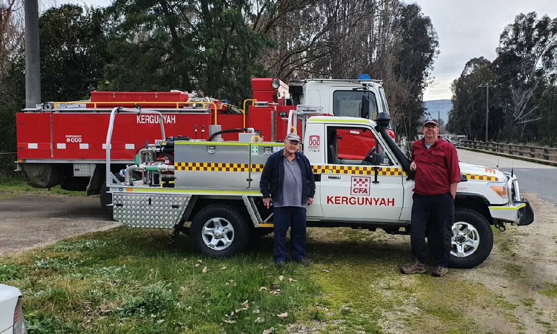 NEW WHEELS: Kergunyah firefighters Frank Tapp and Paul Collins with the Ultralight vehicle.