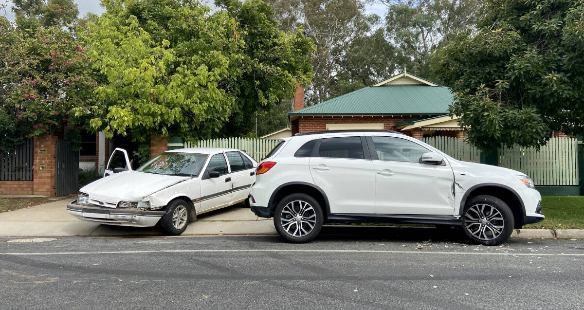 CAR DAMAGE: Both the Ford sedan that was allegedly speeding and the Mitsubishi ASX had to be towed away from Graham Street.