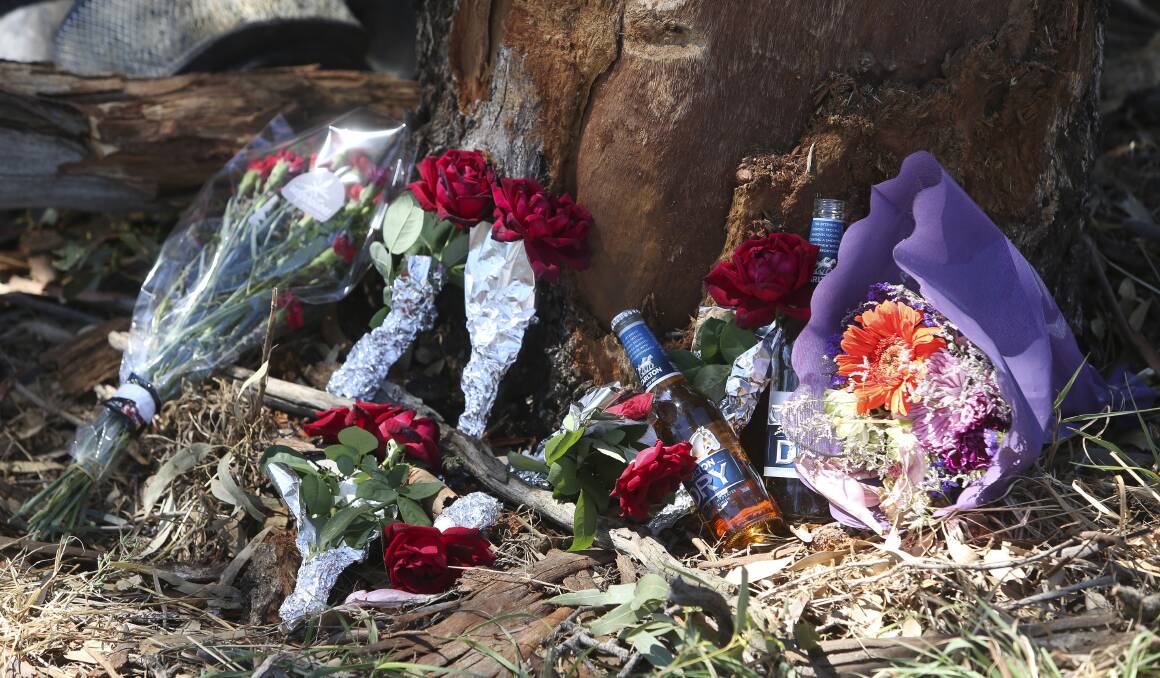 TRIBUTE: Friends left flowers and mementos at the Jindera crash site. 