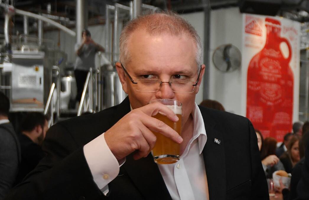 GOOD DAY FOR A BEER: Treasurer Scott Morrison at Capital Brewing Co in Canberra on Friday. Picture: LUKAS KOCH