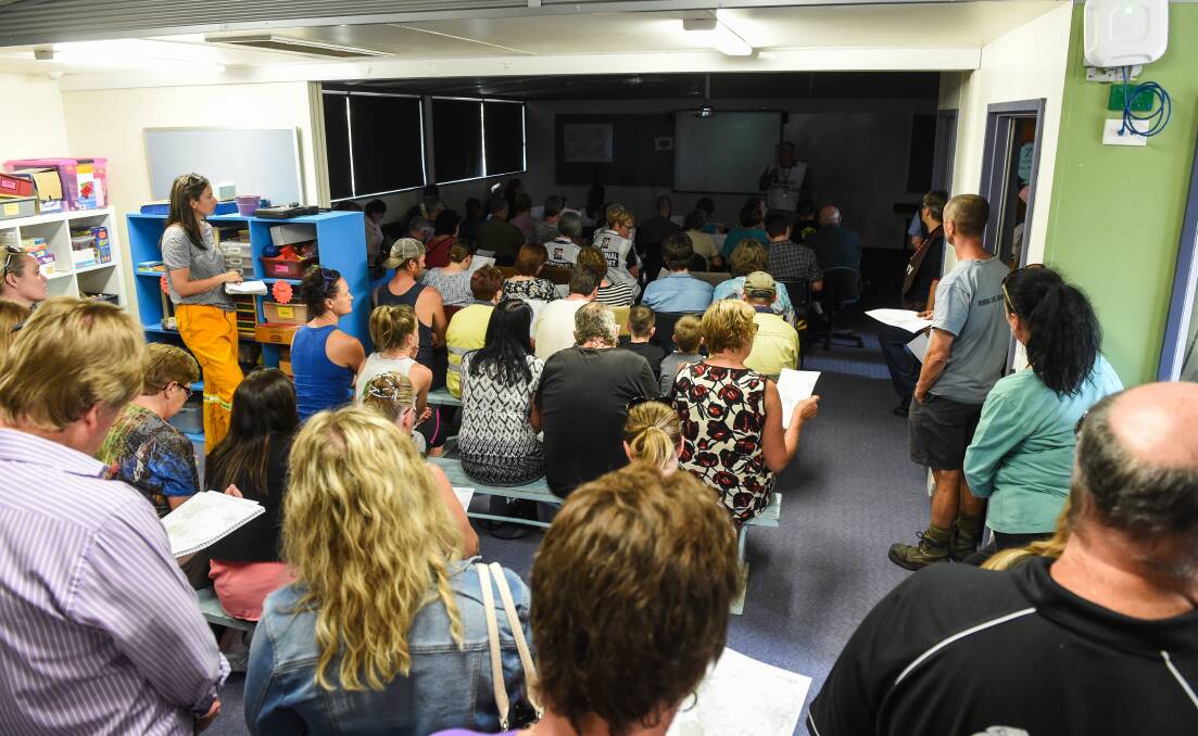 REASSURANCE: About 130 people attended the community meeting at Middle Indigo Primary School. Pictures: MARL JESSER
