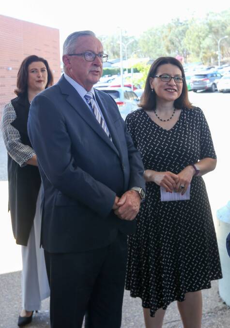 DELAYS: NSW Health Minister Brad Hazzard and Victorian Health Minister Jenny Mikakos at Albury hospital in January.