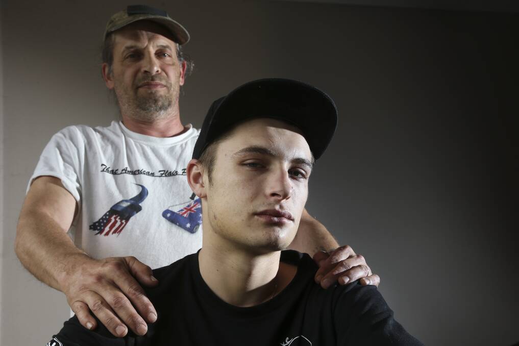 Chris Callesen and his son Michael after the 2016 attack.