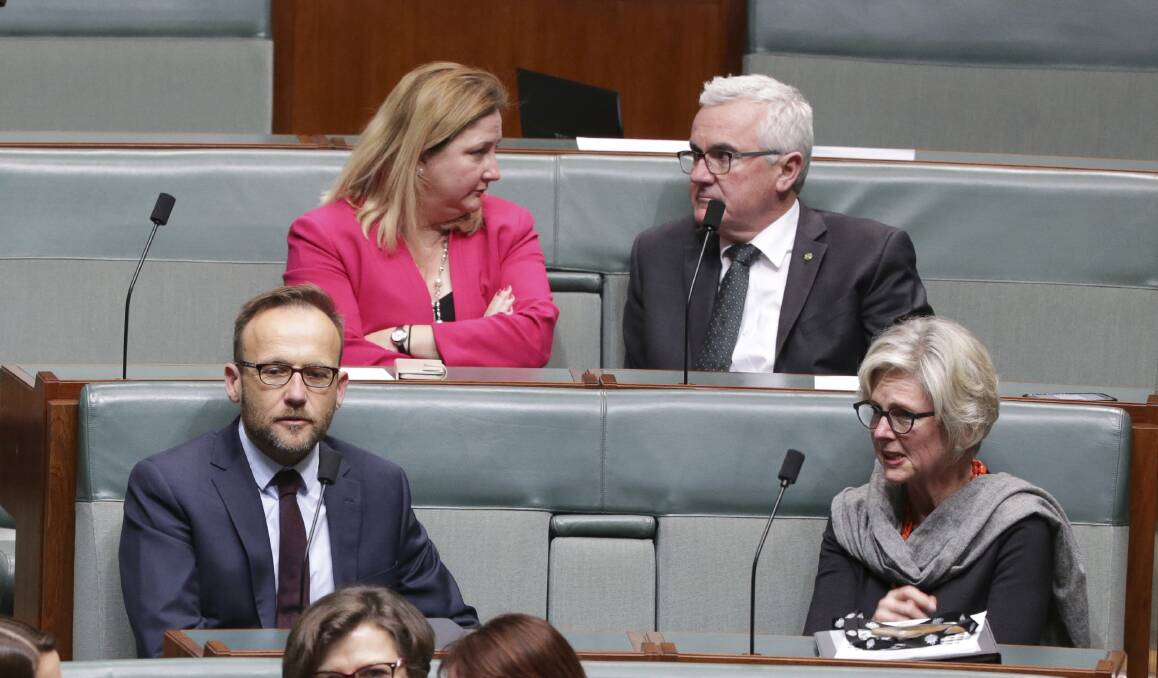 HOUSE DISCUSSIONS: Crossbenchers Adam Bandt, Rebekha Sharkie, Andrew Wilkie and Helen Haines in Parliament this week. Picture: ALEX ELLINGHAUSEN
