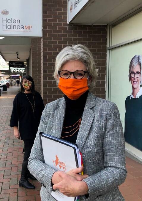 VIRUS PROTECTION: Indi MP Helen Haines has been wearing her orange independent mask this week. She is among Victorians told to isolate before returning to Parliament.