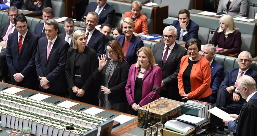 SWEARING IN: (Right) Independents Andrew Wilkie and Cathy Ms McGowan escorted Rebekha Sharkie back into Parliament this week.