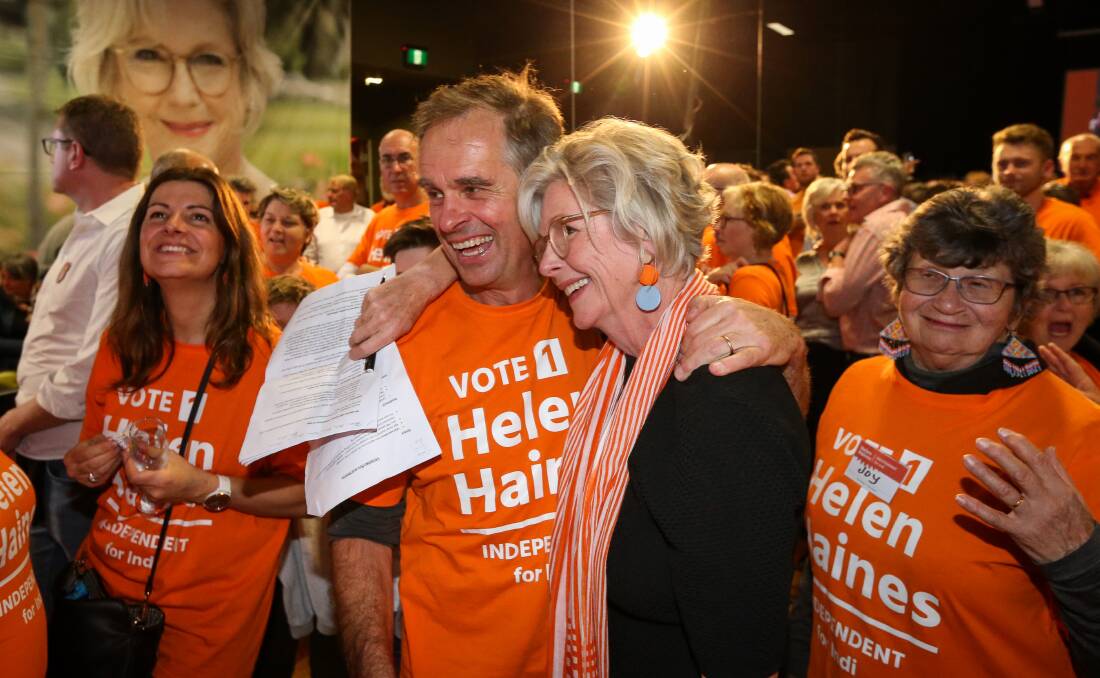 PEOPLE TAKING ACTION: Phil and Helen Haines embraced on Saturday night when it became clear she could be the next member for Indi. Pictures: JAMES WILTSHIRE