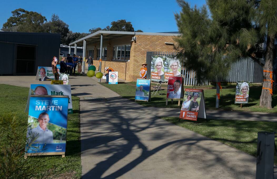 VOTERS' CHOICE: A long election campaign culminated on Saturday at voting centre like this at Wangaratta High School, but counting by the AEC continues.