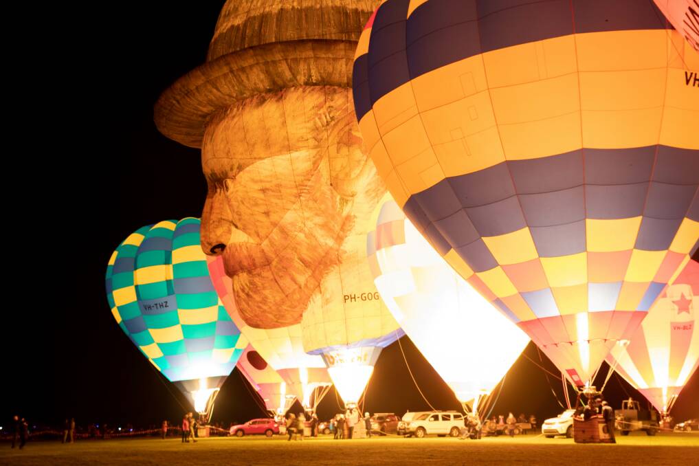 ALL LIT UP: The balloon depicting Vincent Van Gogh was a drawcard to the hot air balloon festival held at Milawa. Pictures: TARA TREWHELLA