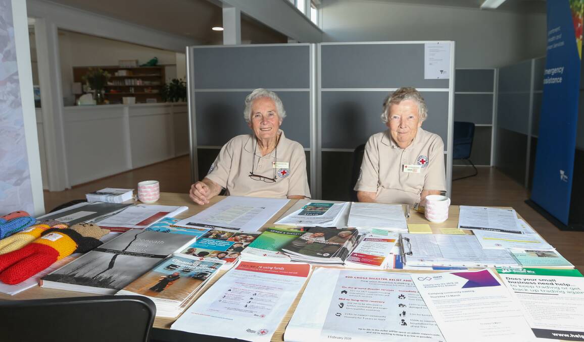 SUPPORT: Red Cross volunteers Pam Sheather and Margaret Davis at the Corryong bushfire relief centre.