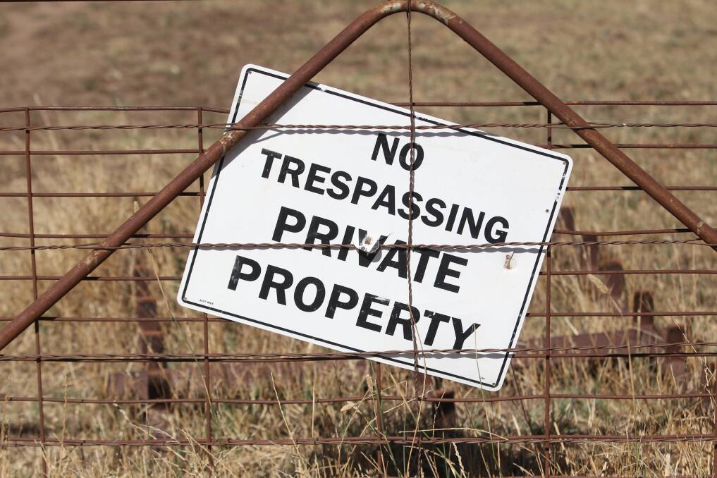 The trespassing sign