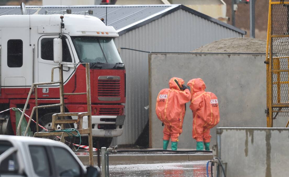 WORKPLACE INCIDENT: Specialist CFA hazmat crews were called to Baxters Concrete in Wodonga on Tuesday. Pictures: MARK JESSER