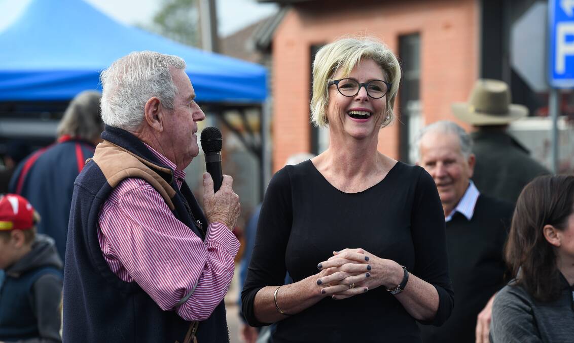 IMPORTANT BUSINESS: Ken Jasper speaking to Indi MP Helen Haines at Saturday's pollie grape stomp. Picture: MARK JESSER