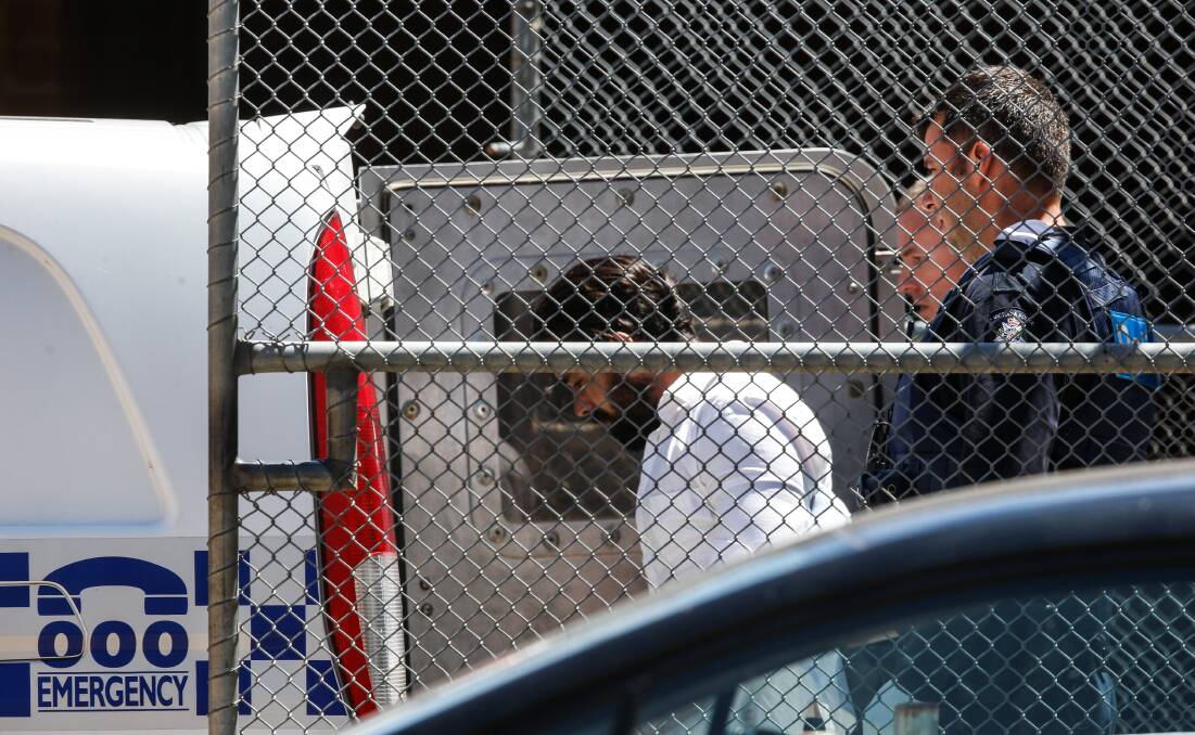 LOCKED UP: Bowe Maddigan at Wangaratta Magistrates' Court in the days after his arrest for murder and rape.