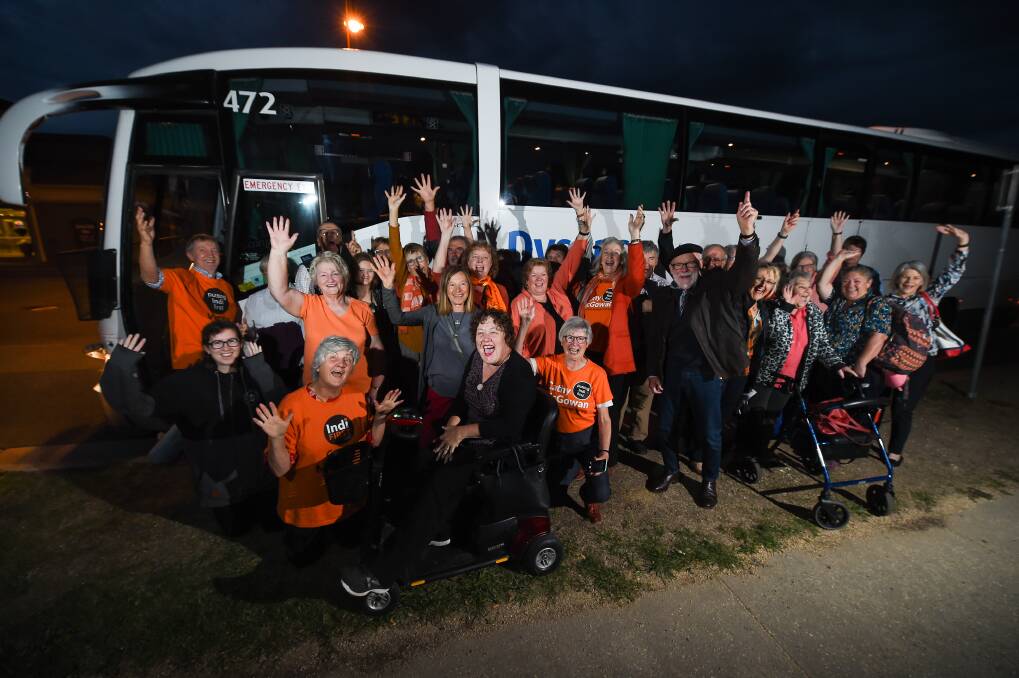 ORANGE ARMY: Supporters donned their "I'm with Cathy" T-shirts and boarded the bus from Wodonga to Canberra yesterday. Picture: MARK JESSER