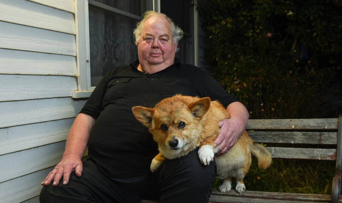 CONTROVERSIAL CORGI: Jeffrey Sill, pictured with his dog Eckles, says he will not be stopped taking his battle against Wodonga Council to the High Court.