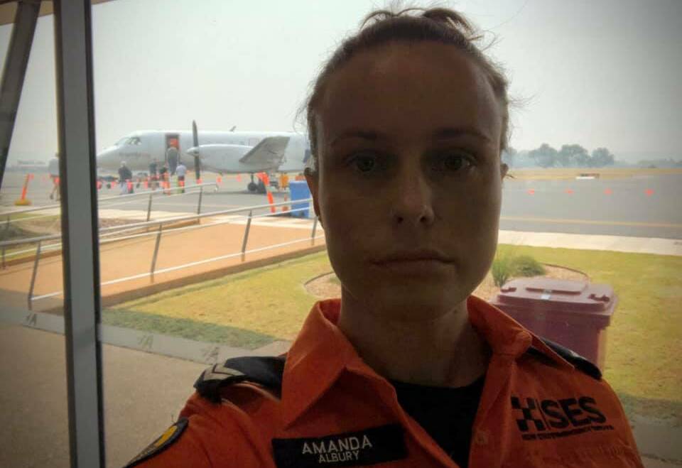 'GUT-WRENCHING': Albury councillor Amanda Cohn in her SES volunteer role when she was deployed to help with the NSW fires before Christmas.