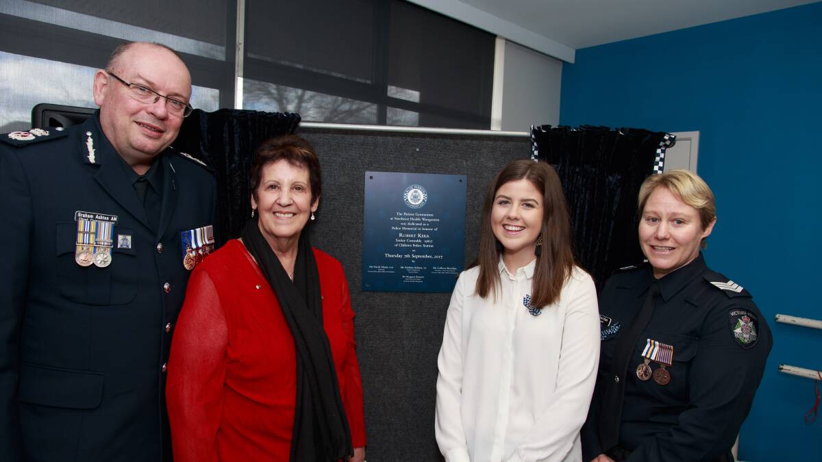 FITTING TRIBUTE: Police, family and friends gathered at Wangaratta hospital to commemorate the Robert Kerr robotics rehabilitation centre. Pictures: SIMON BAYLISS