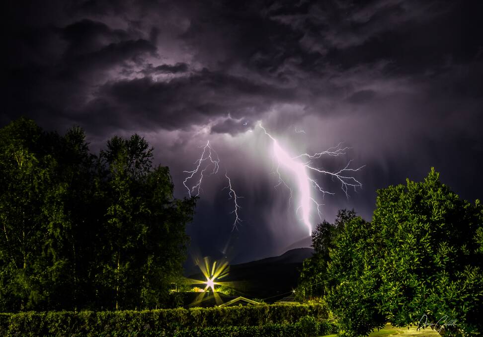 DANGEROUS LIGHT SHOW: The Border has experienced four nights of storms, including this lightning strike captured at Mount Bogong. Picture: DIANE GRIFFITH