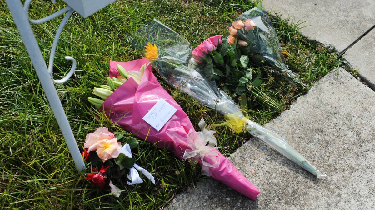 TRIBUTES: Flowers have been laid at the Belle Avenue home of Ora Holt.