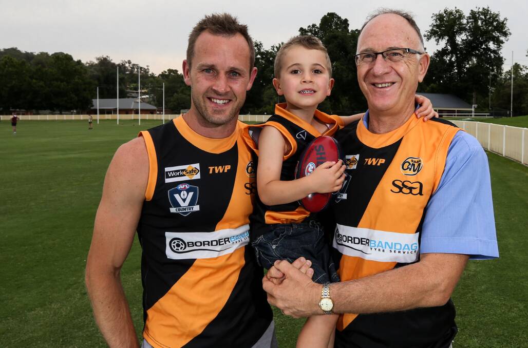 TIGER COUP: Albury recruit Daniel Cross, with son, Tyler, 4, and father, Peter, at the Tigers' Christmas party on Monday. Picture: JAMES WILTSHIRE