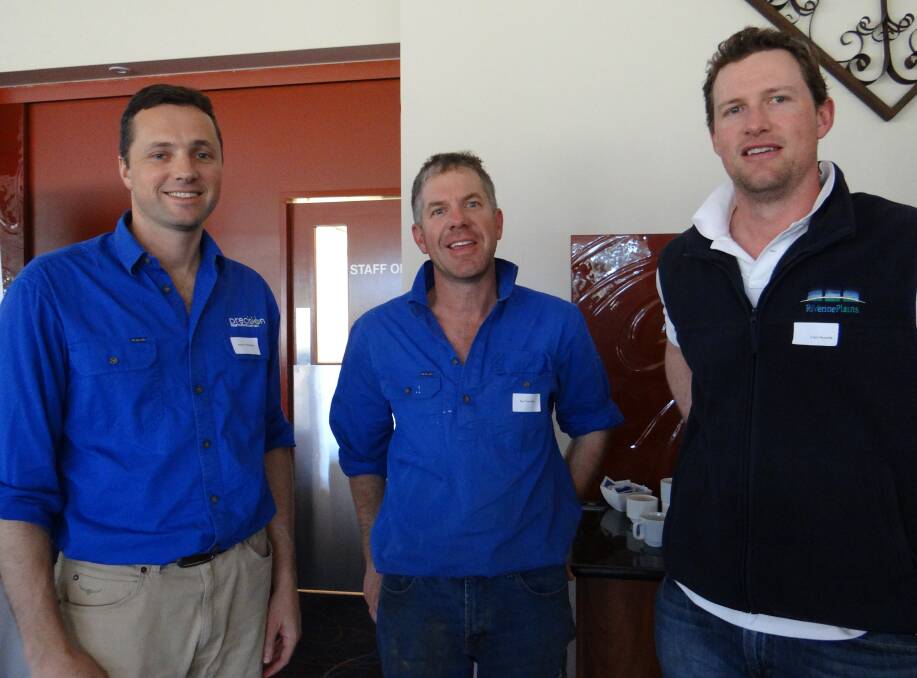 IDEAS: Andrew Whitlock talks with farmers Ian Trevethan, of Howlong, and Brocklesby's Curt Severin during this week's big data workshop at Mulwala.
