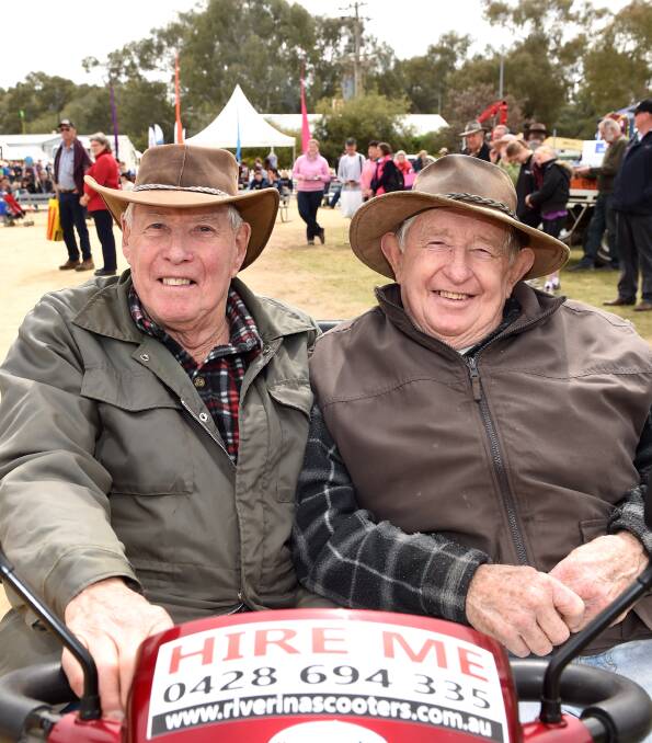  Roy and Bob Baul from Narrandera get around the huge field days site in ease. 