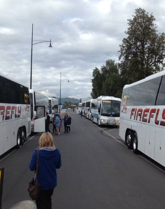 ROAD TO GLORY: A fleet of Sydney-bound buses carrying hundreds of Western Bulldogs fans pulled into Wodonga for breakfast on Saturday.