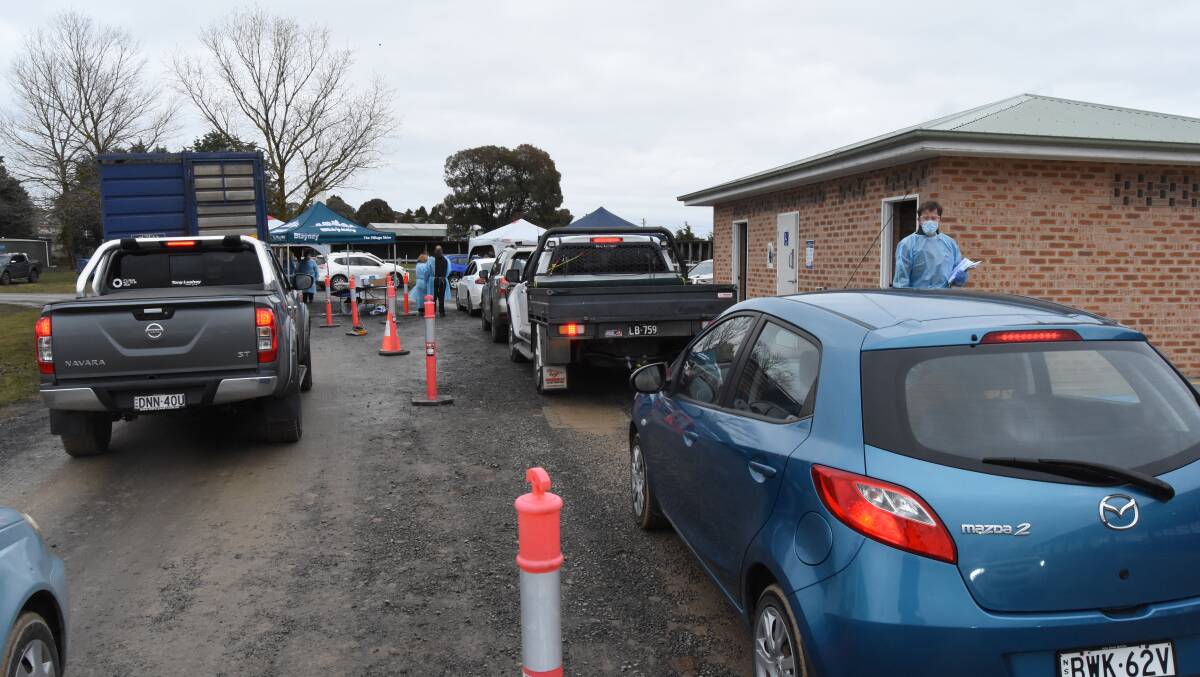 The line up of cars at the Blayney drive-thru testing clinic at the showground. Photo: MARK LOGAN