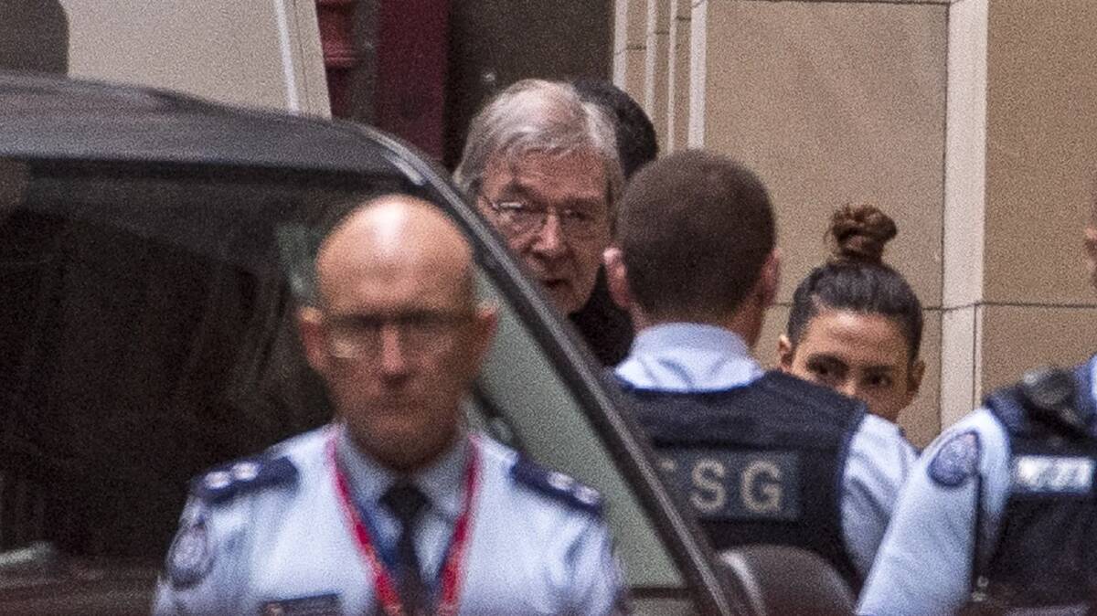 Cardinal George Pell arrives at the Supreme Court on Wednesday morning. Photo: Eddie Jim