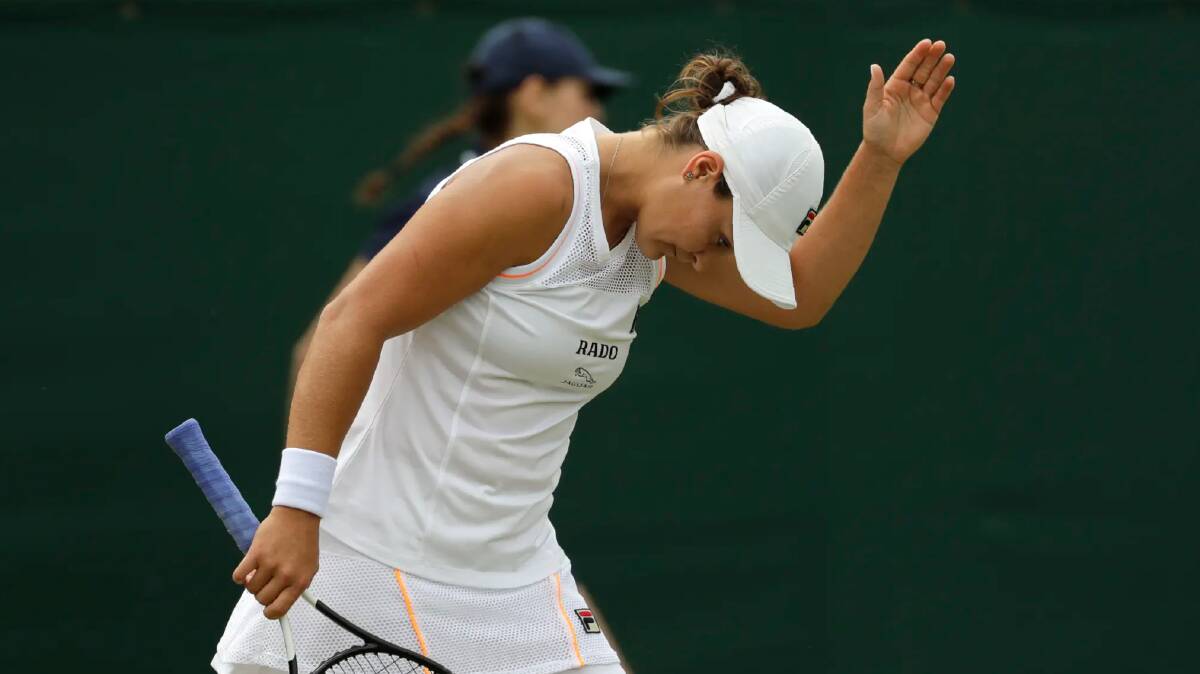 Australia's Ashleigh Barty gestures after missing a point.