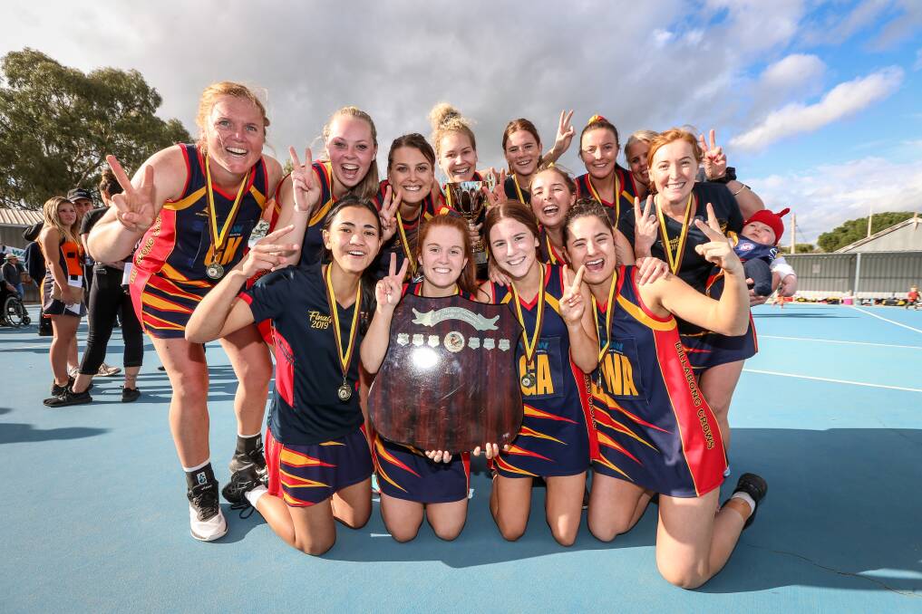 BACK TO BACK WINNERS: Coach Holly Dowling with daughter Adelaide (Del) and the Billabong Crows' A-grade side after winning their second consecutive premiership, defeating Jindera in the grand final this season.