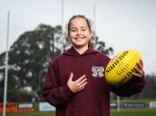 ALL SMILES: Wodonga's Charlotte Coysh, 11, is ready for her next challenge on the field. Picture: MARK JESSER