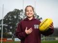ALL SMILES: Wodonga's Charlotte Coysh, 11, is ready for her next challenge on the field. Picture: MARK JESSER