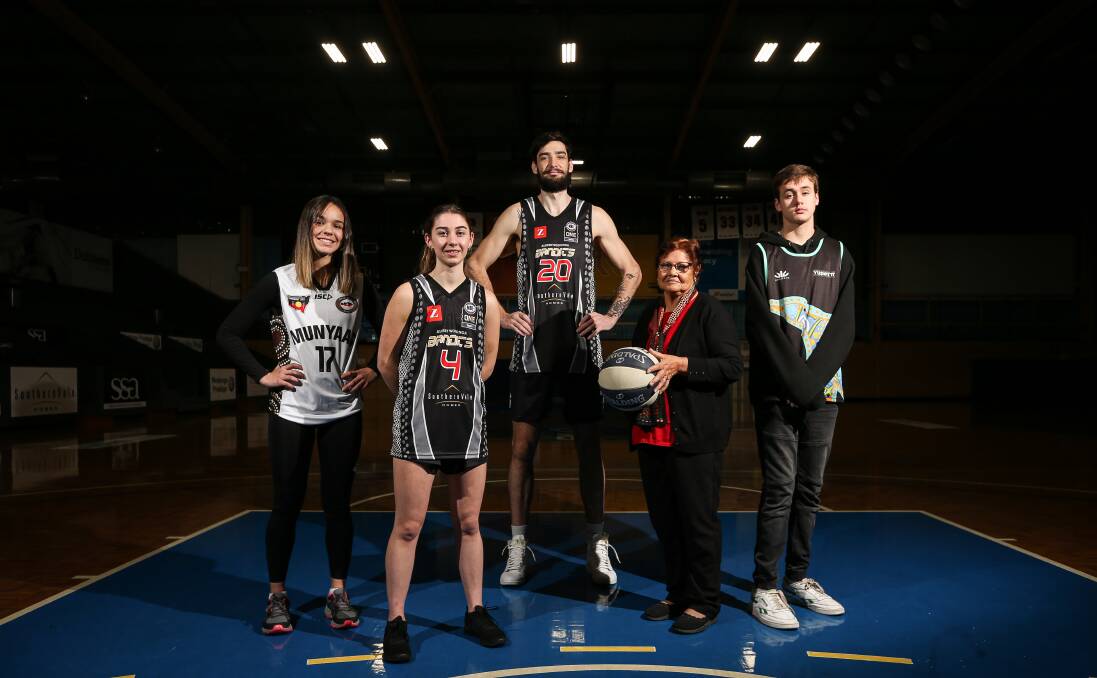 SPECIAL: Star Slater, 13, Casey Ardern, John Crnogorac and Ben Stewart, 14, with Aunty Edna ahead of indigenous round. Picture: JAMES WILTSHIRE
