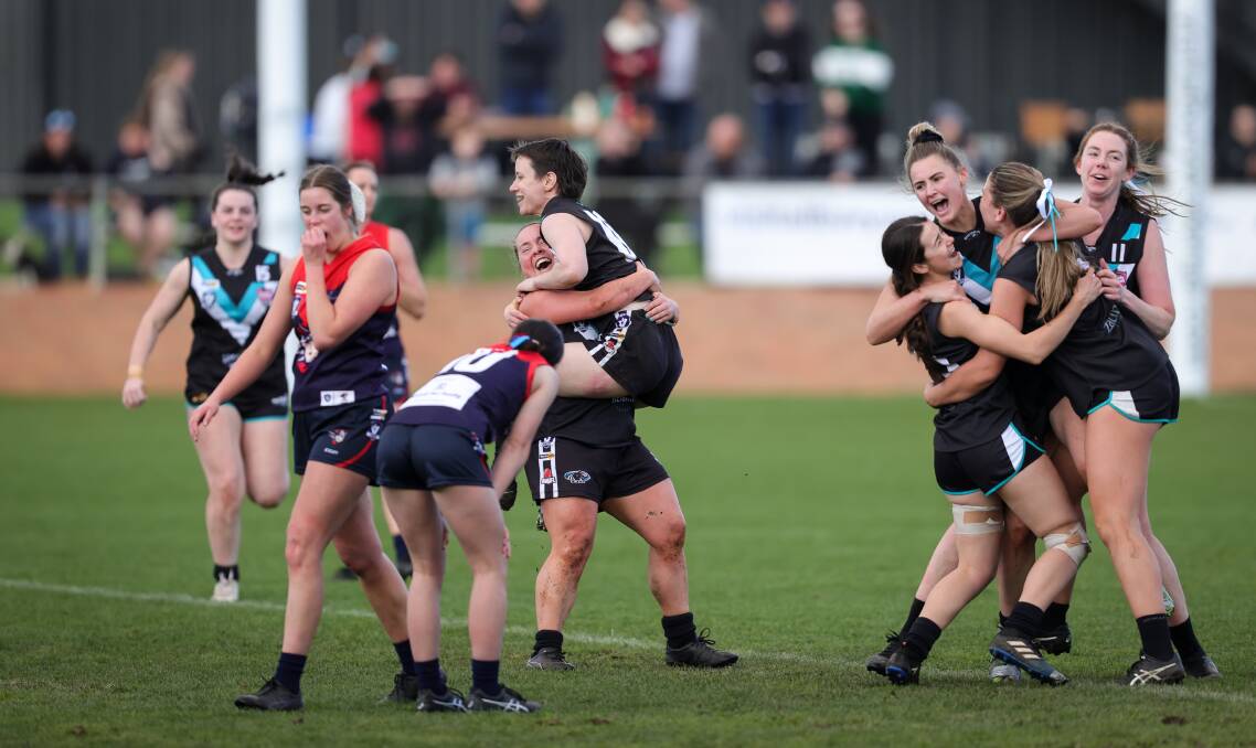 SPECIAL: Lavington celebrates its maiden open North East Border Female Football League flag against Wodonga Raiders. Picture: JAMES WILTSHIRE
