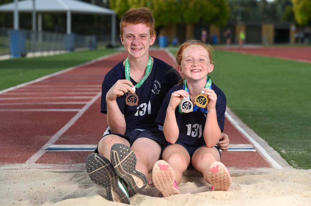 FLASHBACK: Ethan with his sister Mikayla after winning an under-13's bronze medal which has remained a highlight in his young career.
