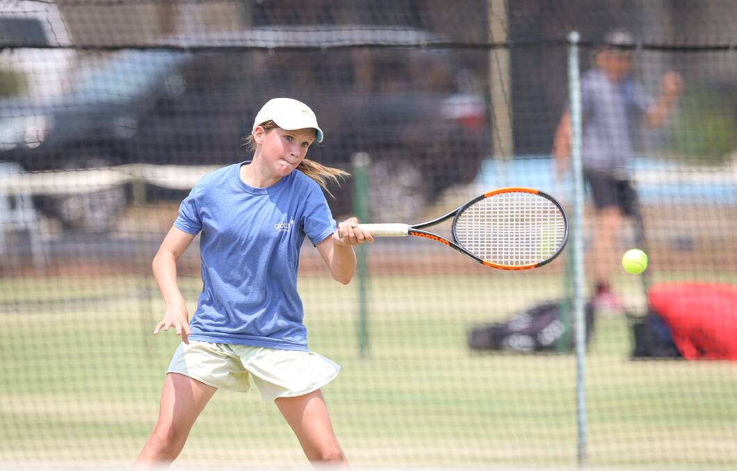 WINNER: Zali Ilitch maintains focus during her 12 and under singles clash at the Victorian Junior Grass Court Championships. Picture: JAMES WILTSHIRE.