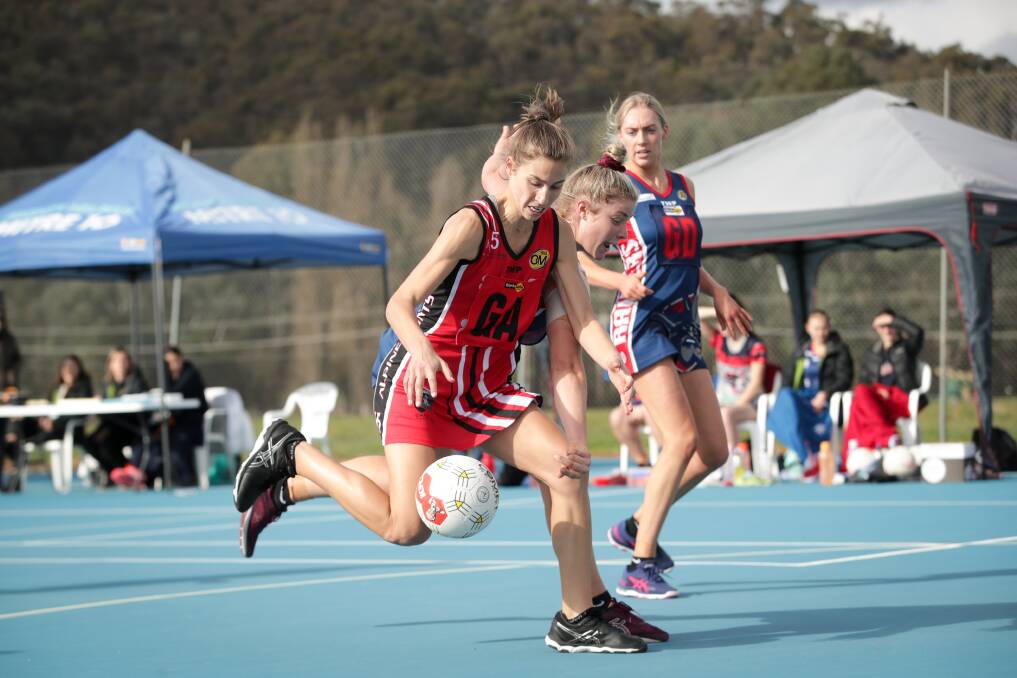 Myrtleford's Saige Broz and Wodonga Raider's Vashti Muller battling it out in the Raiders' narrow win. Picture: JAMES WILTSHIRE.