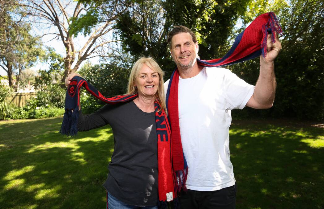 HEART BEATS TRUE: Charlie Spargo's parents Kate and Paul will be cheering for the Demons in the AFL Grand Final. Picture: JAMES WILTSHIRE