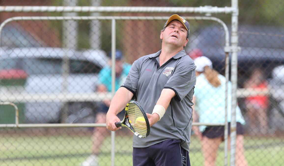 PLAY: Albury Crocs' Michael Reid lines up his serve during the Special B3 Country Week grand final in Wodonga on Friday. Picture: JAMES WILTSHIRE