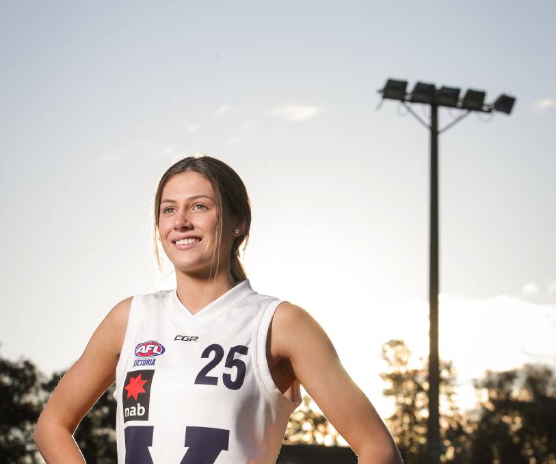Barber to swap football boots for netball dress for grand final