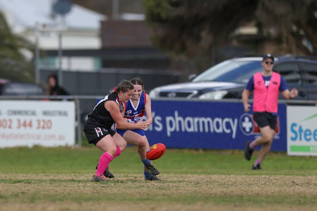 Lavington's Kimberley Crowther and Thurgoona's Chelsea Hargeaves battle for the ball during Sunday's preliminary final.