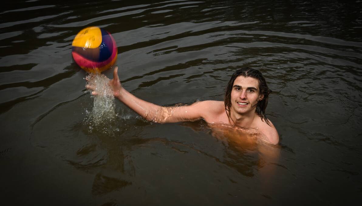 MAKING A SPLASH: Border water polo star Elih Mutsch feels right at home in the Murray River. Picture: MARK JESSER