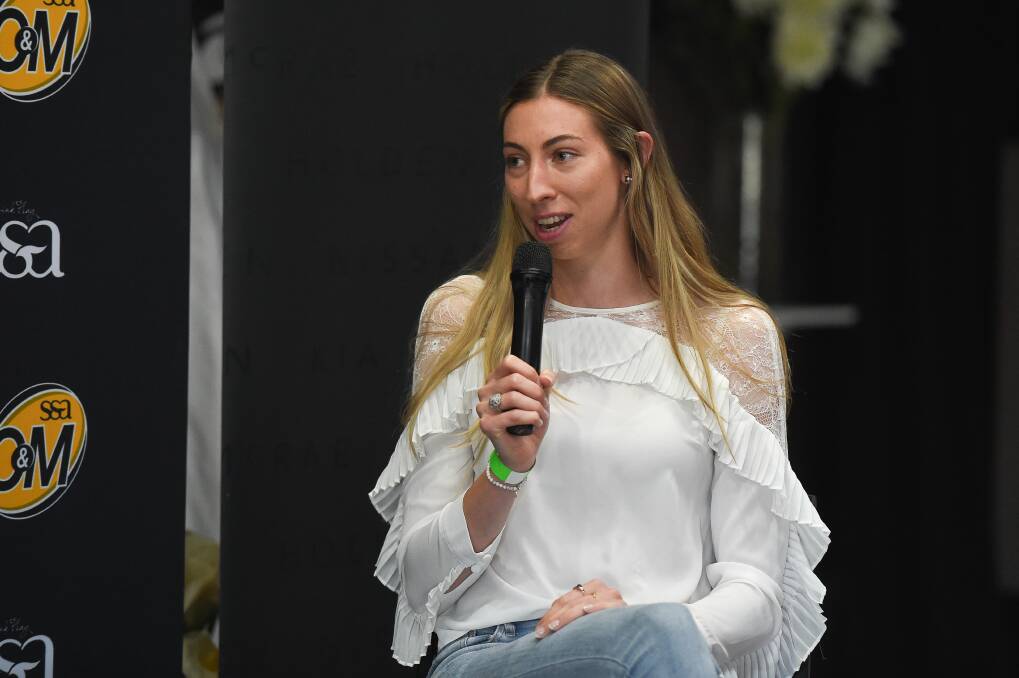 Toni Wilson Medallist and Victorian Fury netballer Jacqui newton speaking at the 2019 O and M grand final.