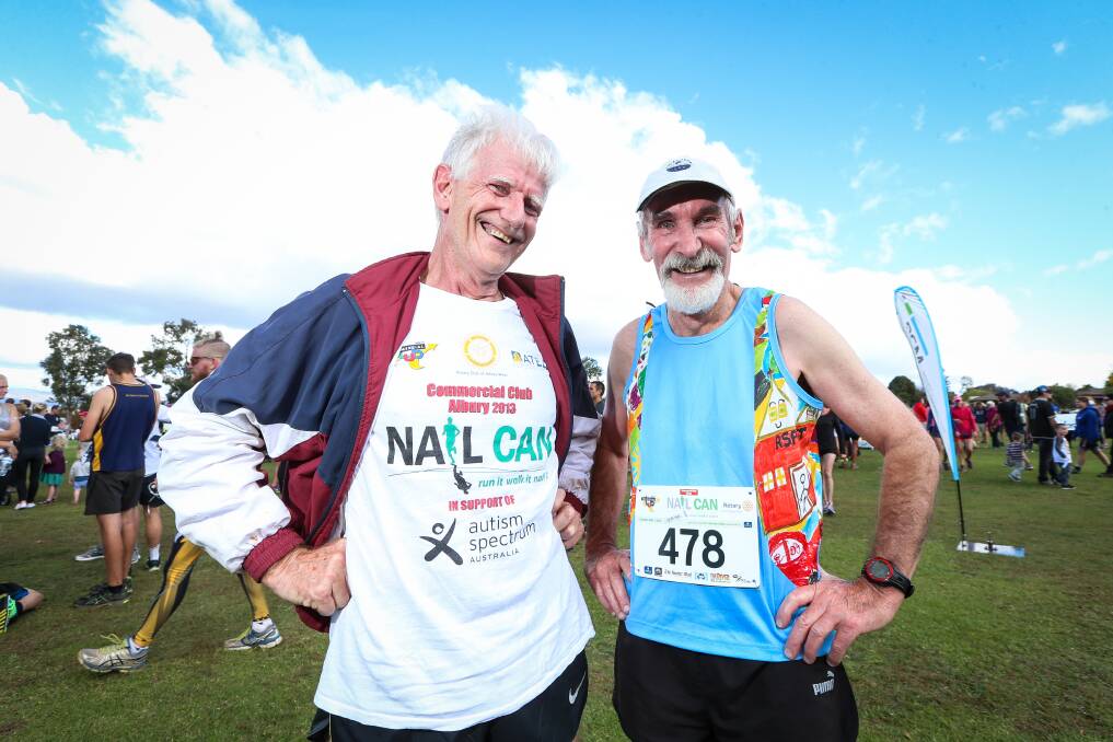 Rob Simmons and Clive Vogel, coach of Vogel's Vixens, who both competed in the first Nail Can Hill Run.