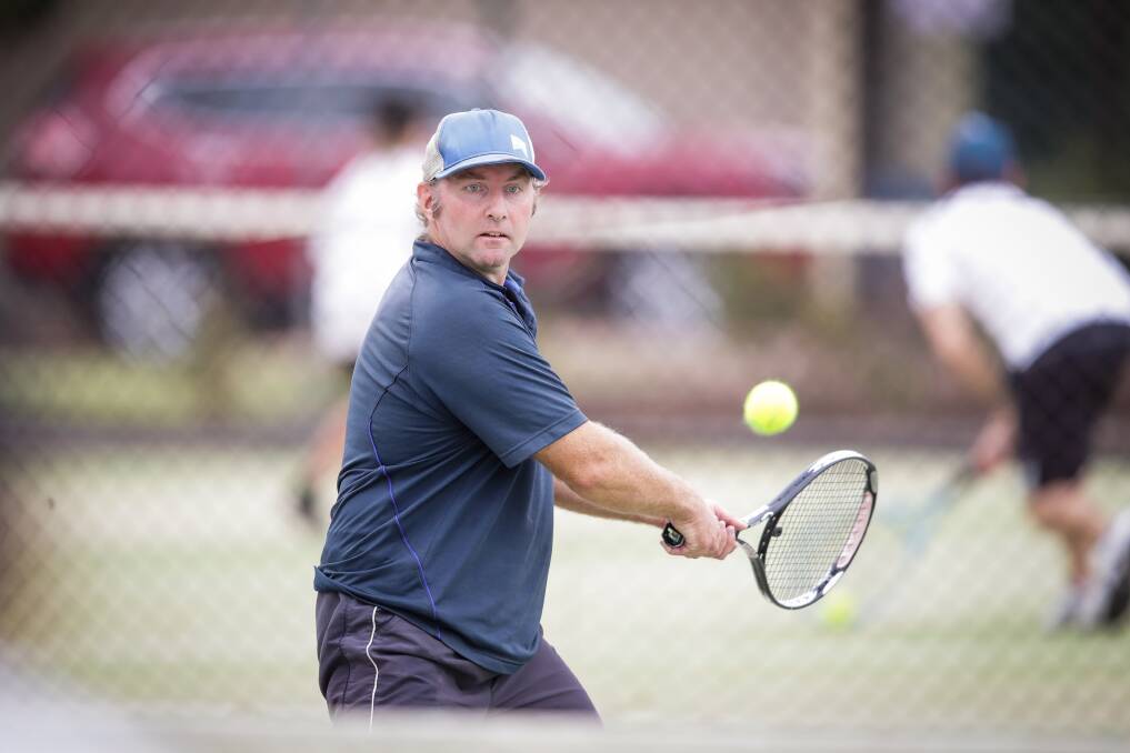 Burrumbuttock's Brad Schulz pictured playing in last season's Hume tennis grand final. The preliminary finals are scheduled to go ahead this weekend at this stage.