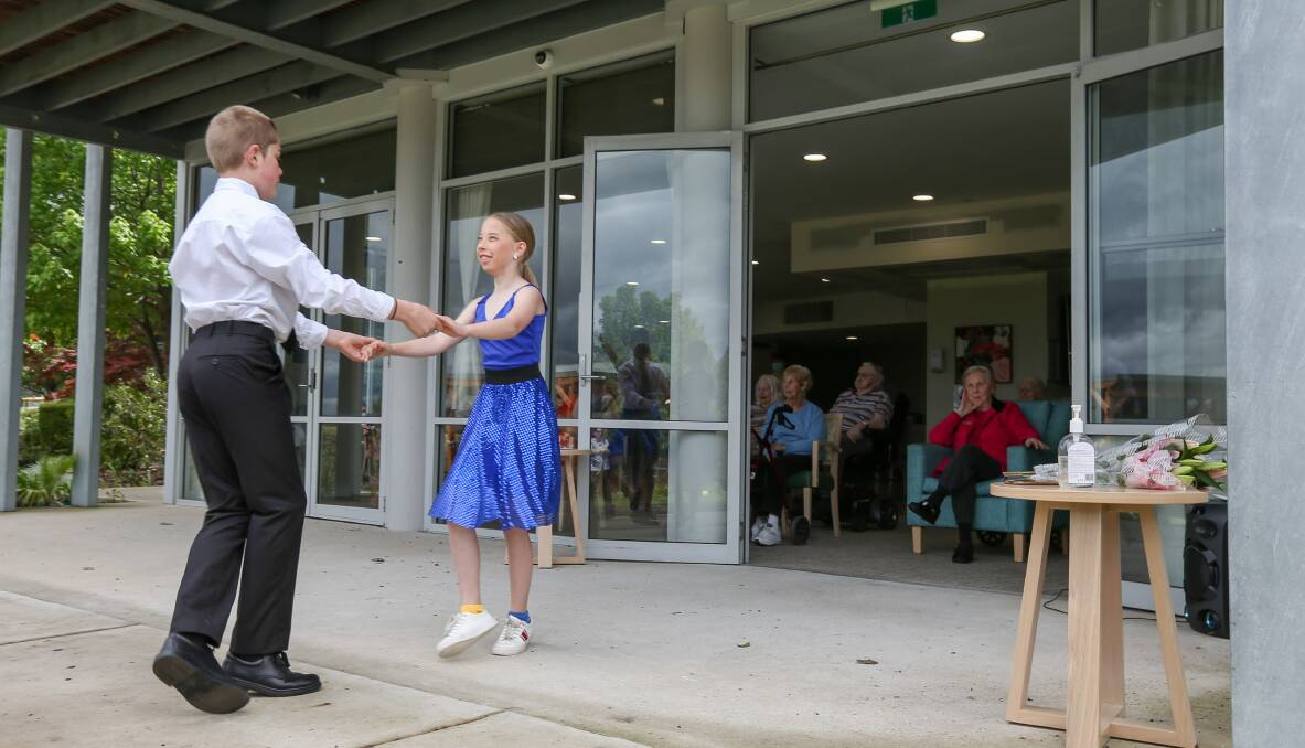 SHOWSTOPPER: Some of the border's talented young dancers put on a show for residents of Albury's Estia Health yesterday outside while they watched on from indoors. Picture: TARA TREWHELLA